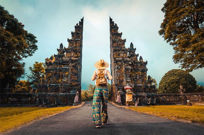 woman-with-backpack-exploring-bali-indonesia-2022